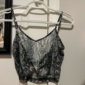 Snake skin shirt. Super cute. Cut out back